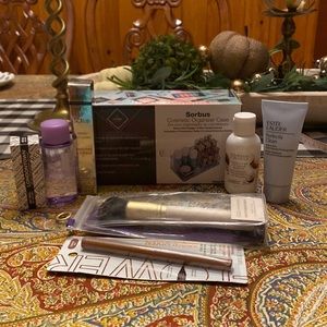 Sorbus cosmetic organizer with various products to go in it.